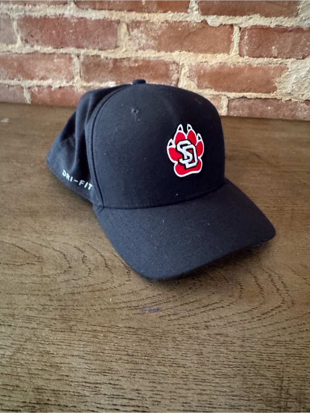 New Era Black Cap with Red Paw Logo